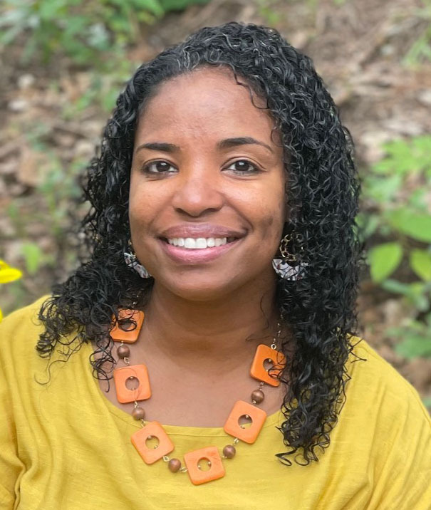 Tomika Berry smiles brightly for her photo.